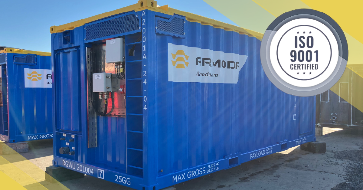 A blue ARMODA modular offshore unit with ISO 9001 certified badge