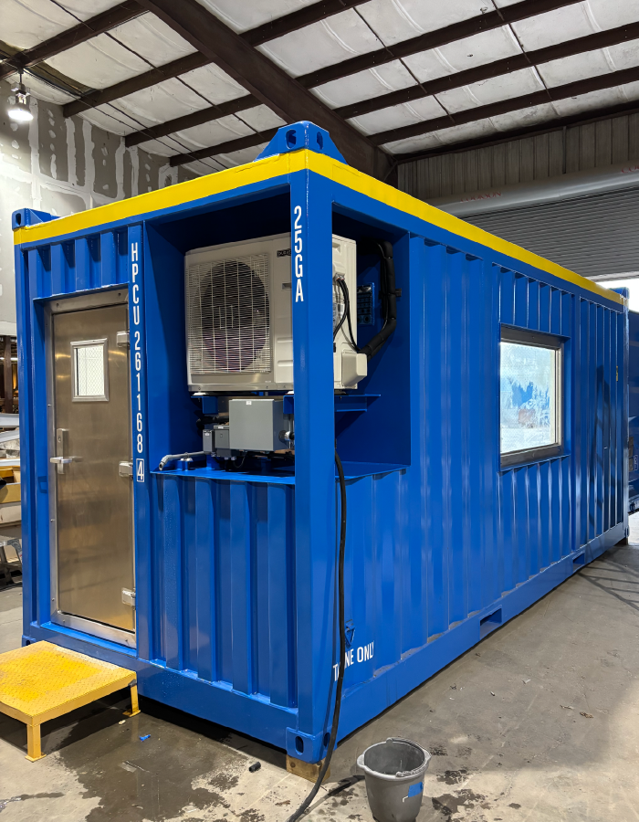 DNV 2.7-1 offshore container modified with HVAC equipment, personnel door and window.